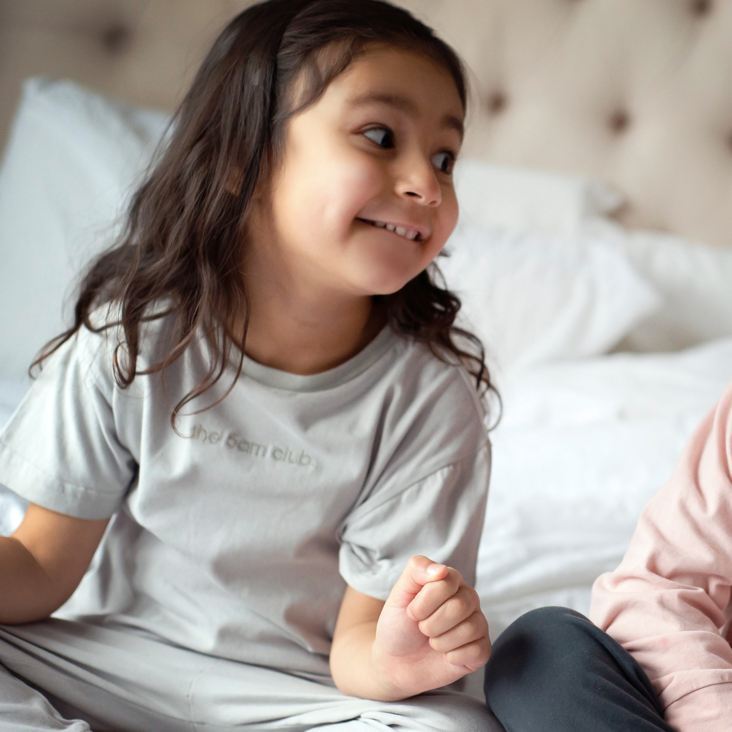 light grey kids t-shirt with the 5am club logo on the chest