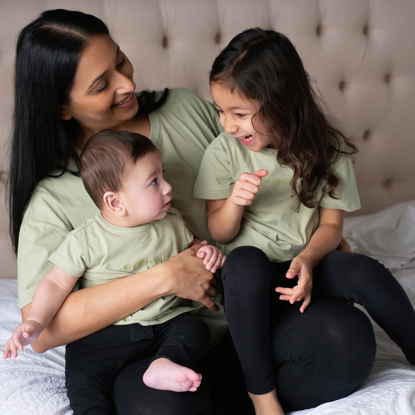 sage green womens t-shirt with the 5am club logo on the chest