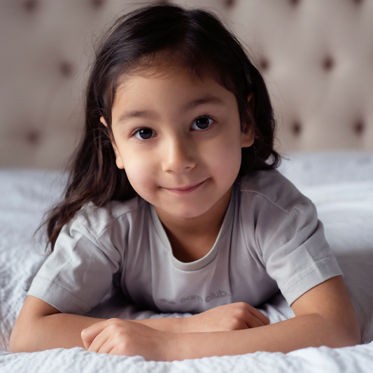 light grey kids t-shirt with the 5am club logo on the chest