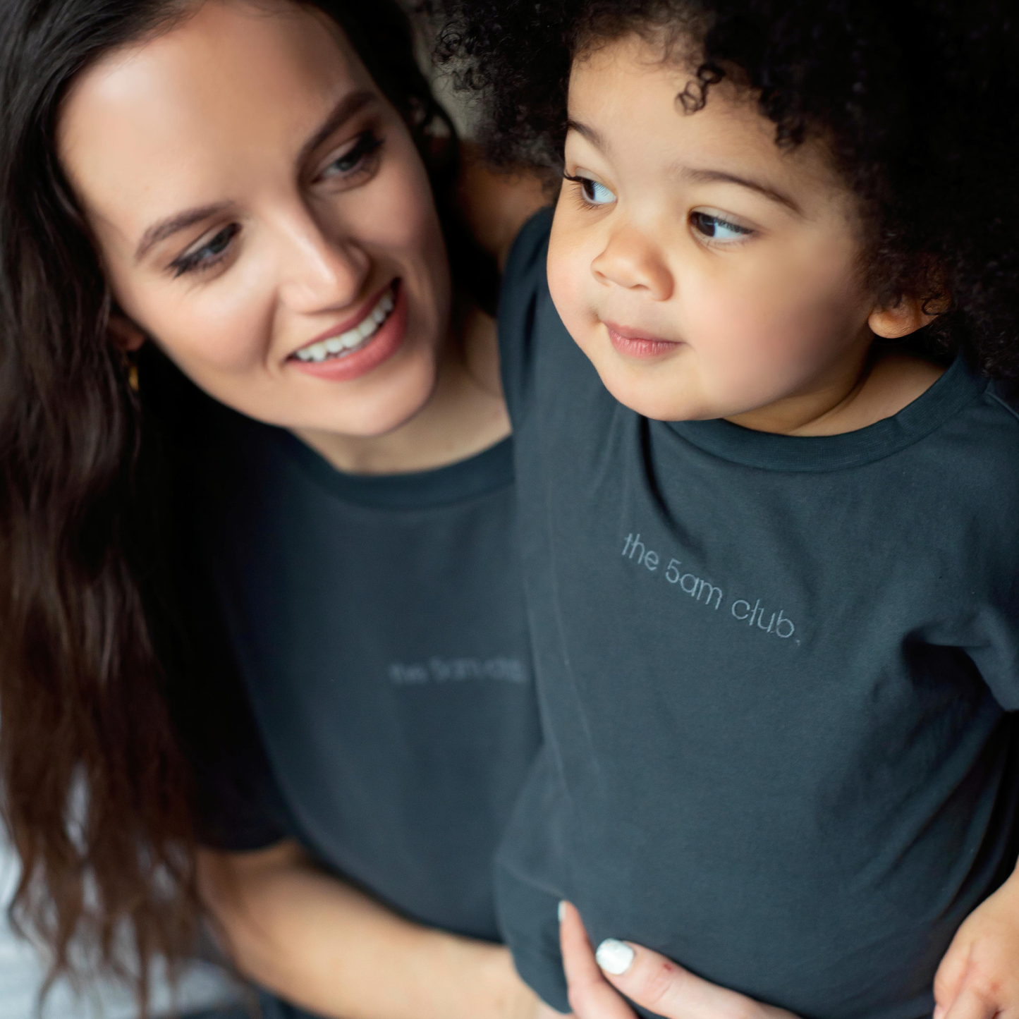 charcoal kids t-shirt with the 5am club logo on the chest