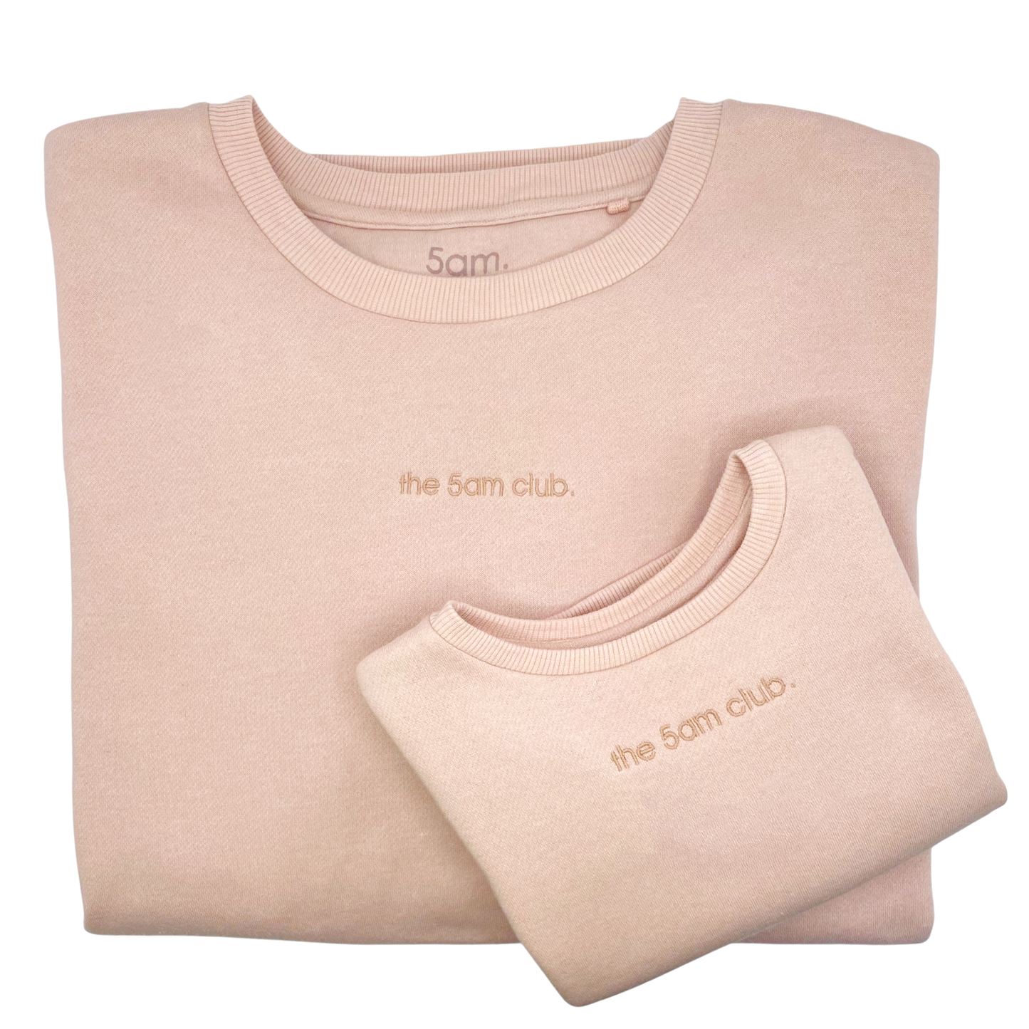 blush pink kids sweatshirt with the 5am club logo on the chest