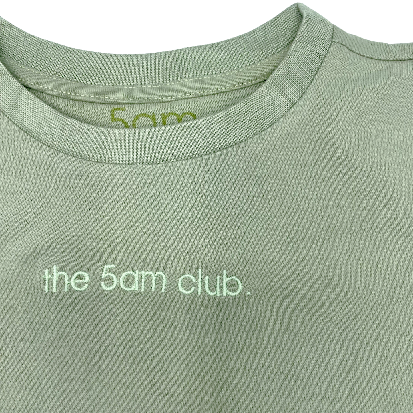 sage green kids t-shirt with the 5am club logo on the chest 
