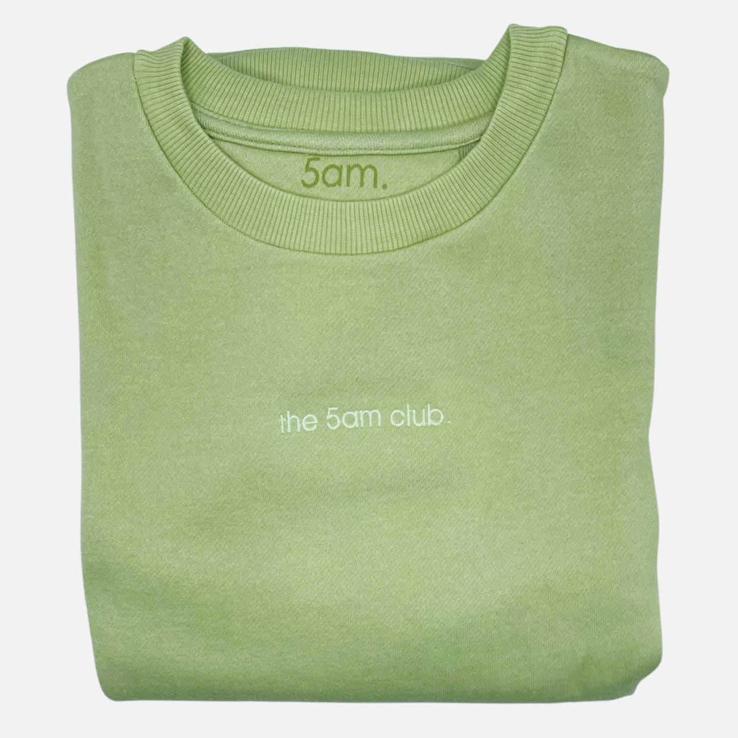 sage green womens sweatshirt with the 5am club logo on the chest