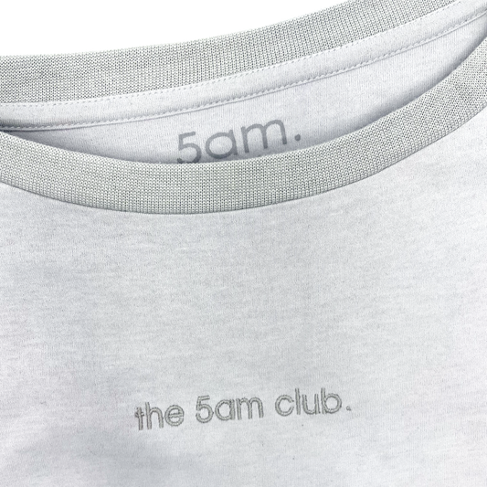 light grey womens t-shirt with the 5am club logo on the chest